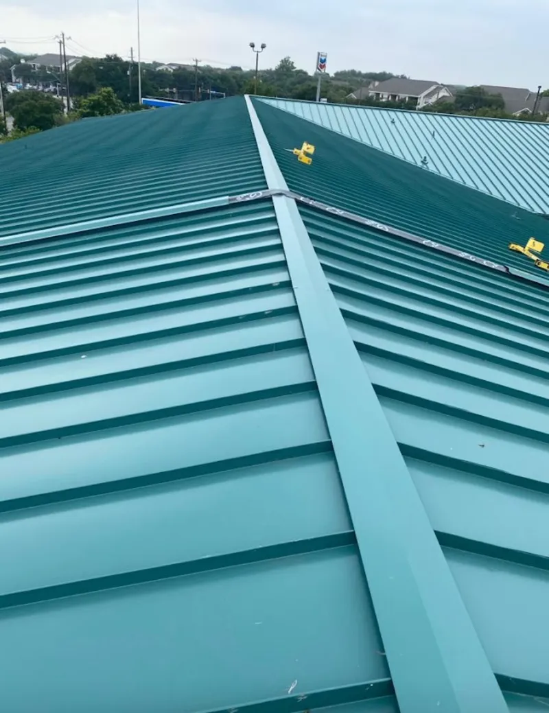 Green commercial metal roof ridge and valley for Metal Roof Repair in Cheshire